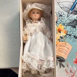 Elegant Italian Porcelain Doll in White Lace Dress